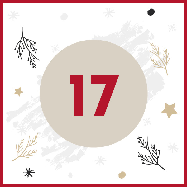 Ein runder, beigefarbener Hintergrund zeigt die Zahl 17 in kräftigem Rot. Umgeben von dekorativen Elementen wie Ästen, Sternen und Schneeflocken in verschiedenen Farben auf einem weißen Hintergrund mit rotem Rand.