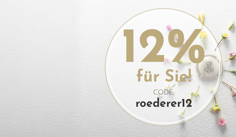 Ein runder, goldener Text zeigt -12% für Sie!- auf einem hellen, strukturierten Hintergrund. Neben einem Korken sind kleine, bunte Blumen verteilt. Ein Rabattcode -roederer12- ist ebenfalls zu sehen.