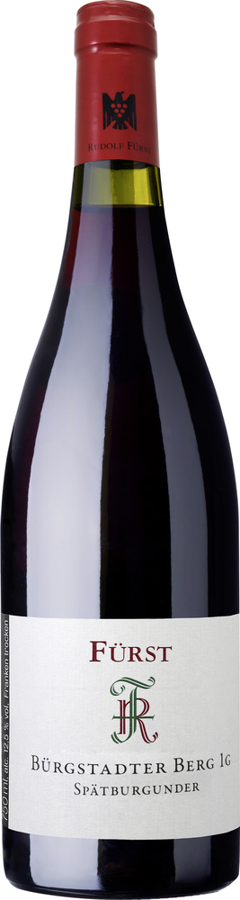 Bürgstadter Berg Spätburgunder Eine Weinflasche mit rotem Korken. Der Flascheninhalt ist dunkelrot. Auf dem Etikett steht -Fürst- und -Bürgstädter Berg 1g Spätburgunder- in schwarzer und grüner Schrift.