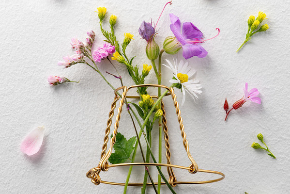 lr_small_floral_bouquet_in_our_muselet_louis_roederer_high_res