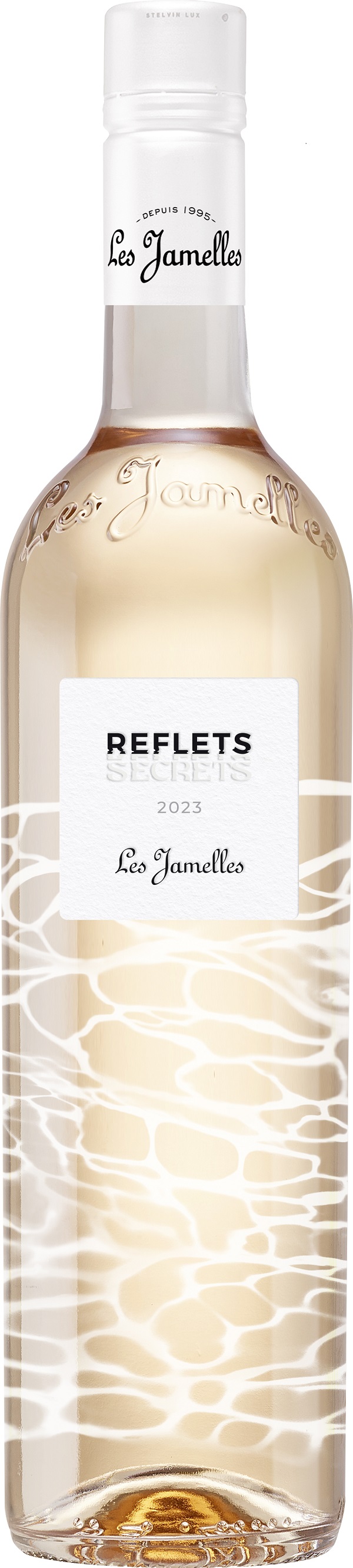Reflets Secrets Rosé Eine Flasche Roséwein mit einem eleganten, geschwungenen Etikett. Der Wein hat eine hellrosa Farbe und das Etikett zeigt den Text -REFLETS 2023- und -Les Jamelles-.